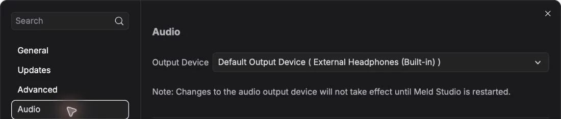 Audio settings showing the Output Device menu.